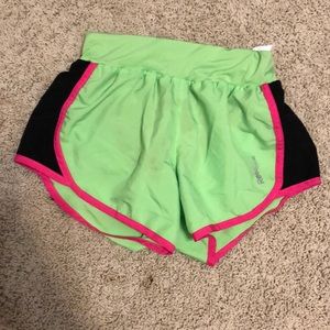 Green athletic shorts